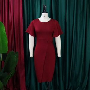 Detail of burgundy flare sleeve dress with side button decor and wrap slit hemline