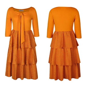 Detailed front and back view of orange polka dot tiered dress with drawstring neckline