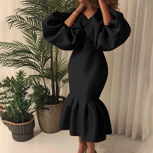 Elegant black satin V-neck mermaid dress with dramatic puff sleeves for formal events