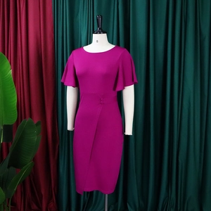 Detail of fuchsia sheath dress showing ruffled butterfly sleeves and waist buckle detail