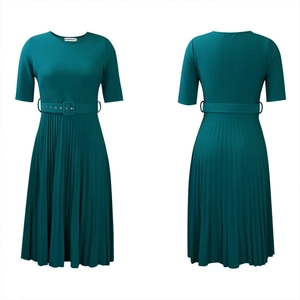 Front and back view of a dark green pleated dress with a round neck and matching waist belt