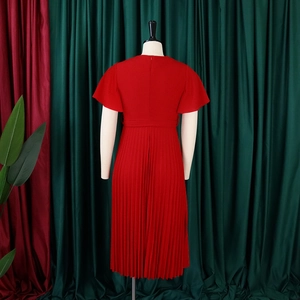 Detailed back view of red pleated V-neck chiffon dress with short sleeves and waist tie