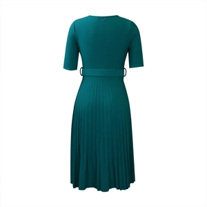 Rear view of teal round neck pleated dress with waist belt and short sleeves detail