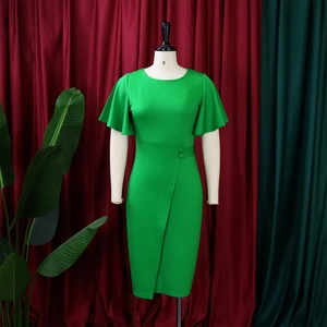 Detail of green sheath dress with flutter sleeves and decorative side waist buttons
