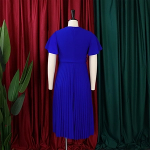 Detail view of royal blue pleated midi dress back with waist tailoring on mannequin