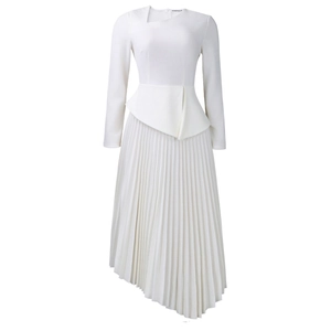 Detail of the elegant white long-sleeve dress with asymmetric pleated skirt and waist sash
