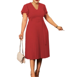 Detail of red V-neck pleated dress with ruffle sleeves and a matching square buckle belt