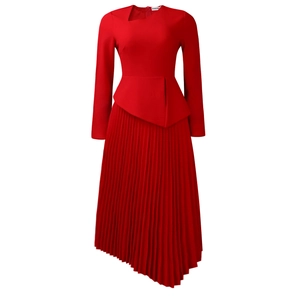 Detailed view of the elegant asymmetrical neck and layered waist on a red midi dress