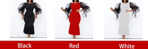 Close-up of mesh sheer puff sleeves and fishtail hemline in black, red, and white
