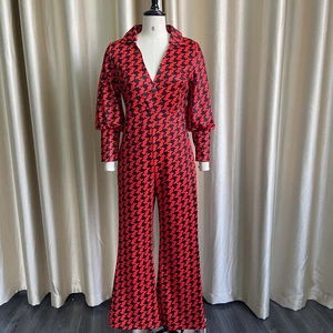 Women's V-neck long sleeve jumpsuit with red and black geometric pattern and wide-leg trousers