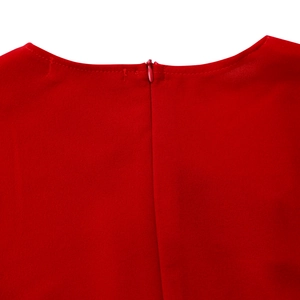 Detail view of red elegant dress featuring seamless back invisible zipper and fine stitching
