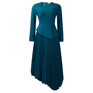 Detail of teal long-sleeve dress featuring pleated skirt and asymmetrical hemline