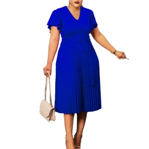 Detail of royal blue V-neck dress featuring pleated skirt and matching square buckle belt