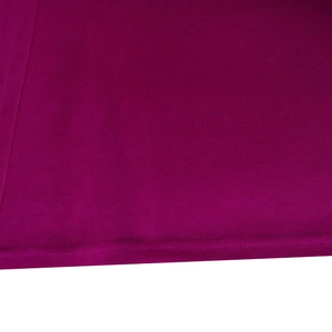 Macro detail of purple knit fabric texture and high-quality double-needle hem stitching