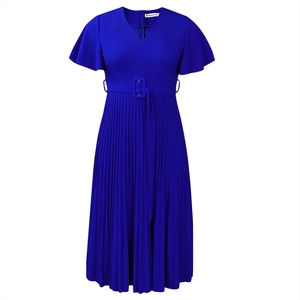 Close-up of royal blue pleated dress featuring ruffle sleeves and a waist belt detail