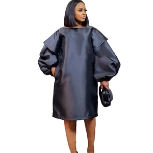 Elegant dark grey satin puff sleeve dress with a loose silhouette and lustrous finish