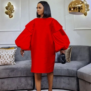 Elegant red oversized bubble sleeve midi dress with boat neck and silky satin texture