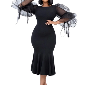 Slim fit black midi dress with sheer mesh puff sleeves and an elegant fishtail hemline