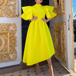 Detail of multi-layered ruffle sleeves on this fluorescent yellow A-line party dress