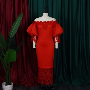 Detail of red off-shoulder dress featuring lace embroidery and puff sleeves for party