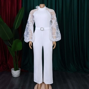 Elegant white long sleeve wide leg jumpsuit with floral lace sleeves and belted waist