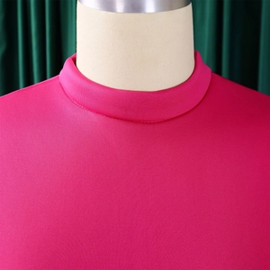 Close-up detail of the round neckline on a vibrant rose red summer dress for women