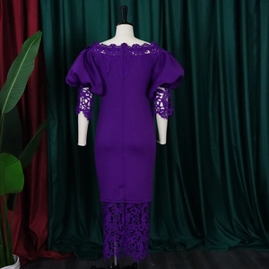 Detail of purple off-shoulder dress featuring lantern sleeves and delicate lace patchwork