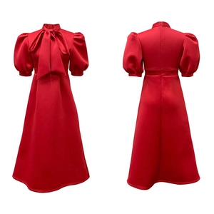 Detail view showing front and back of a red A-line party dress with bow neckline