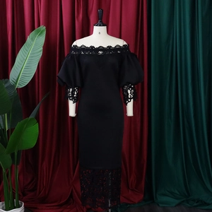 Detail of off-shoulder lace neckline and elegant long sleeves on black cocktail dress
