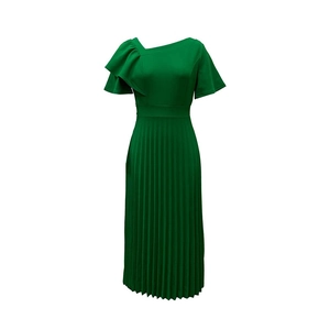 Detail of green midi pleated dress featuring asymmetrical neckline and ruffle sleeves