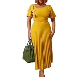 Detail of ginger yellow pleated dress featuring ruffle sleeves and cinched waist design