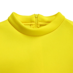 Detail of high neck bright yellow dress featuring hidden back zipper with KYC metal puller