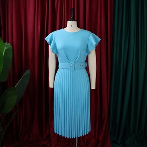 Detail of light blue pleated dress with ruffle sleeves and matching belt on mannequin
