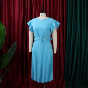 Close-up of sky blue pleated dress featuring ruffle sleeves and matching waist belt