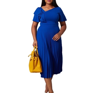 Detail of royal blue pleated dress featuring ruffle short sleeves and cinched waistline