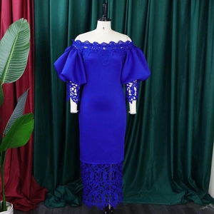 Detail of off-shoulder royal blue plus size dress with lace bubble sleeves and floral trim