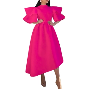 Detail of multi-layered ruffle sleeves and high neckline on a fuchsia A-line dress