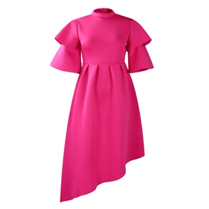 Detail of rose red tiered ruffle sleeves and irregular hemline of the elegant dress