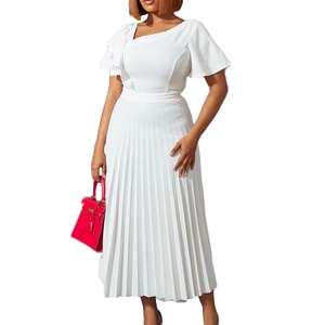 Detailed view of white pleated dress with ruffle sleeve and asymmetric waist