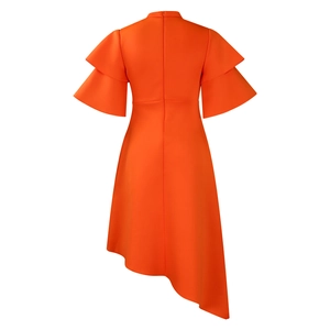 Detail of orange dress showing stand-up collar and double-layer ruffled sleeves