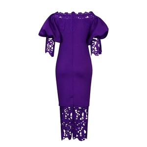 Detail of elegant purple lace trim and hollow embroidery on the bridesmaid dress hem