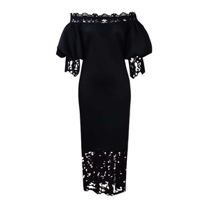 Close-up of intricate lace trim and puffed sleeves on black off-shoulder dress
