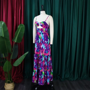 Detail of bohemian floral maxi dress featuring chest hollow-out and metal ring design
