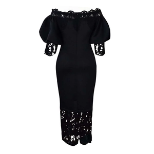 Detail of off-shoulder lace neckline and puff sleeves on black plus size evening dress