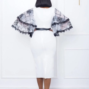 Elegant white pencil dress with V-neck, black lace flare sleeves and a slim waist belt