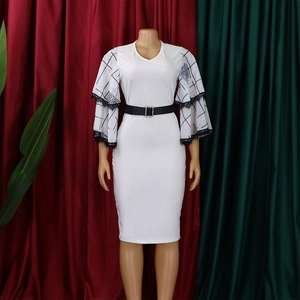 Detail of white pencil dress featuring double flared sleeves with black lace and check pattern