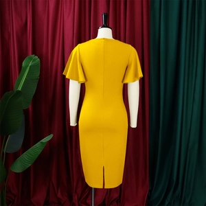 Detail of a yellow bodycon midi dress featuring a back zipper and ruffled butterfly sleeves