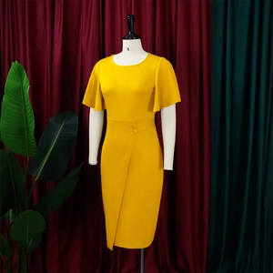 Detail of yellow bodycon dress with ruffle sleeves, waist buttons, and front slit skirt