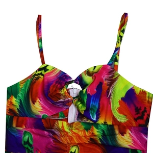 Detail of colorful feather print fabric with zipper and ruched chest design on a summer top