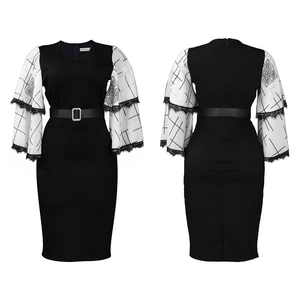 Detail of V-neck pencil dress featuring white flare mesh sleeves with floral pattern